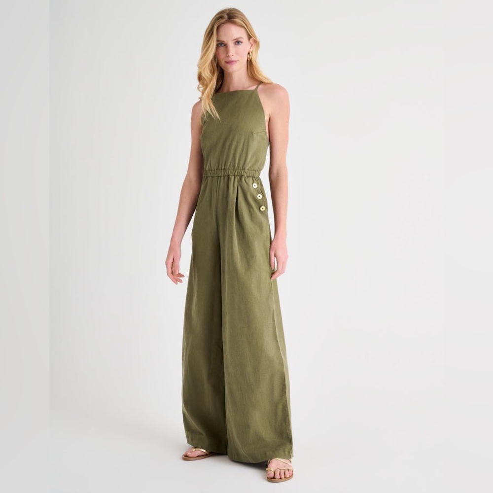 Elegant Green Halter Jumpsuit with Flowing Wide-Leg Design